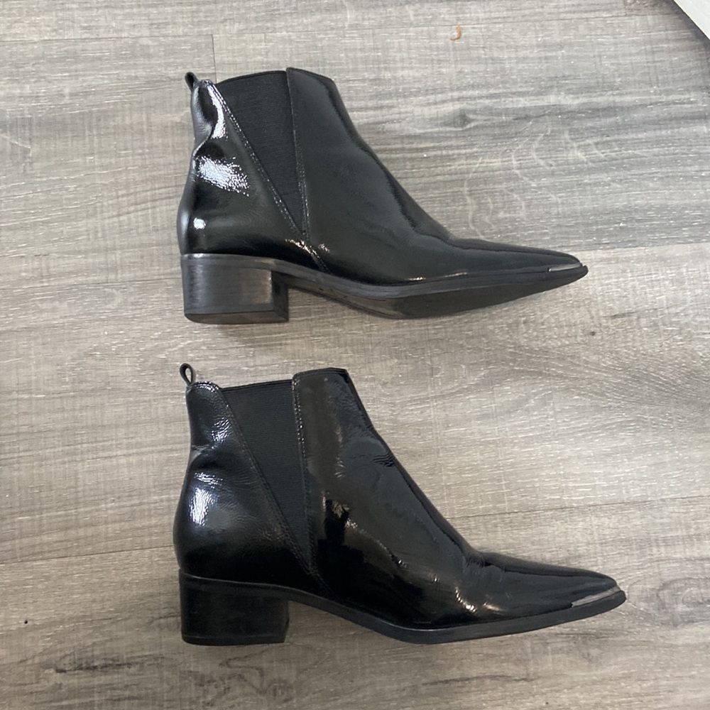 Black Marc Fisher patent leather Chelsea boots